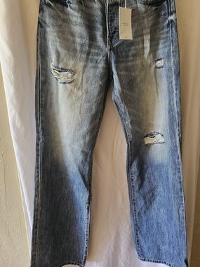 KanCan Women's Light Blue Flare Jeans with Distressed Detail